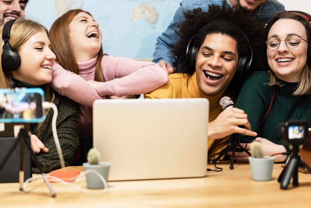 multiracial-friends-streaming-online-using-mobile-QJ5PW5Y.jpg